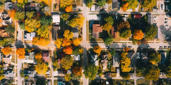 a neighborhood from above in autumn